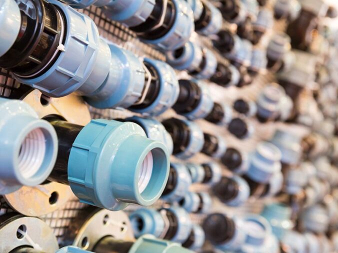 PVC unions on display at a plumbing store
