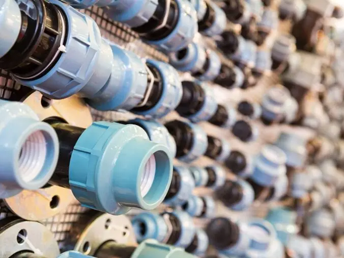 PVC unions on display at a plumbing store