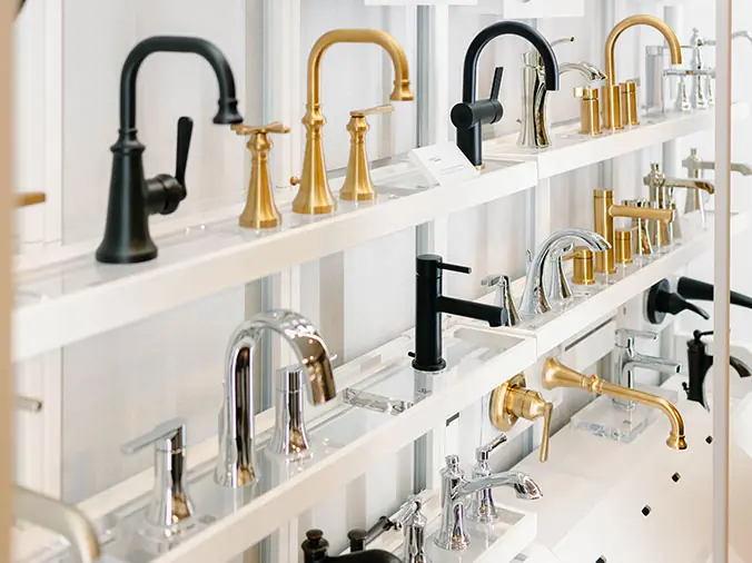 Bathroom sink faucets opn displat in the Hughes Supply Greenville Showroom