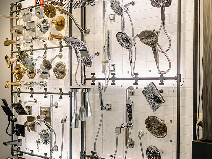 Delta shower heads on display at Hughes Supply Greenville