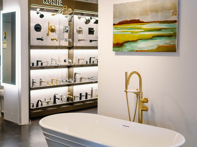 Kohler faucet display and bathtub at Hughes Supply Greenville