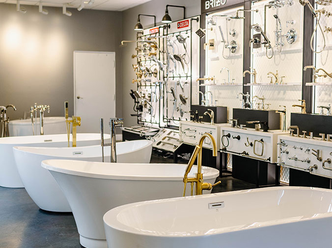 Free-standing bathtubs and hardware at the Hughes Supply Greenville Showroom