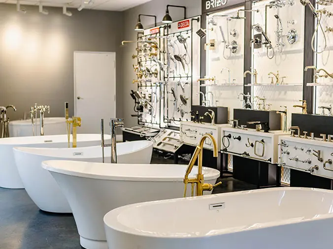 Free-standing bathtubs and hardware at the Hughes Supply Greenville Showroom